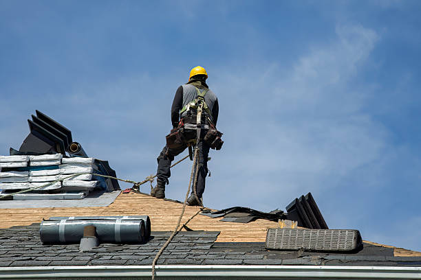Professional Roof Replacement technician working in Larkspur, CA